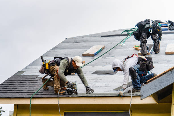 Professional Roofing technician working in Englewood Cliffs, NJ